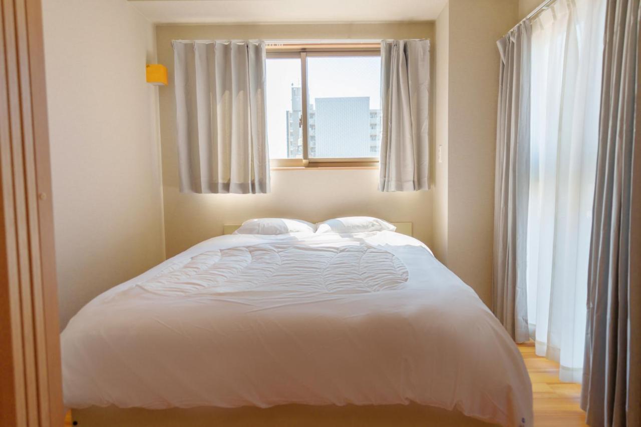Dc桜の苑601洋室双人床 Hotel Osaka Eksteriør billede